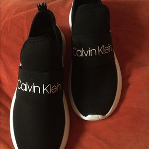 Brand New Calvin Klein slide on sneakers.